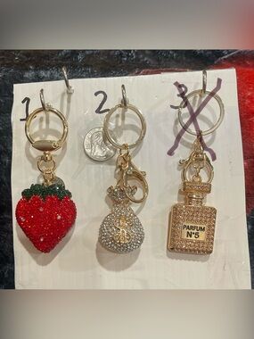 #8 Choice of 1 Strawberry, Money Bag or Perfume Keychain with Gold Accents